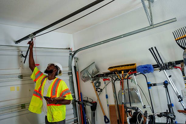 Professional Garage Door Panel Replacement technician working in Attica, IN